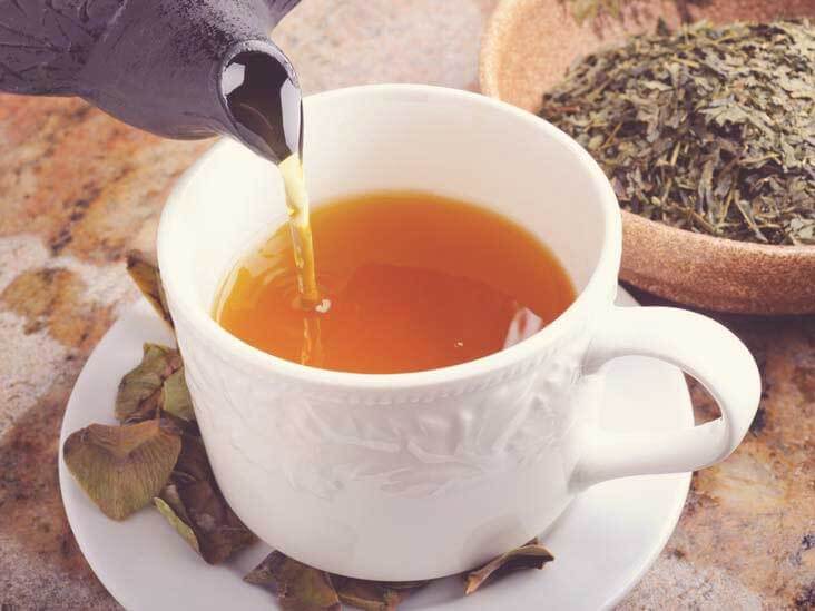 Green tea leaves in a pot
