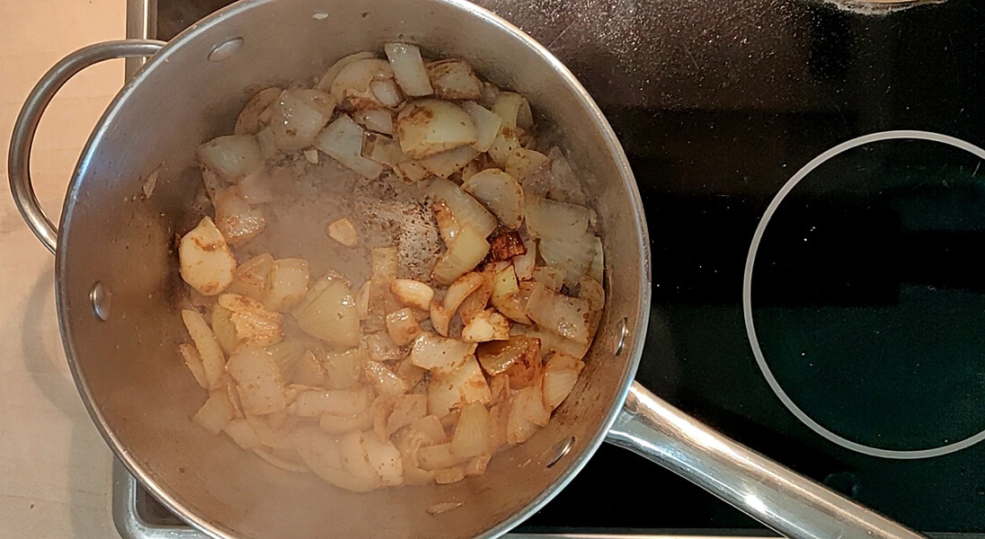 Frying off onions, garlic and spices