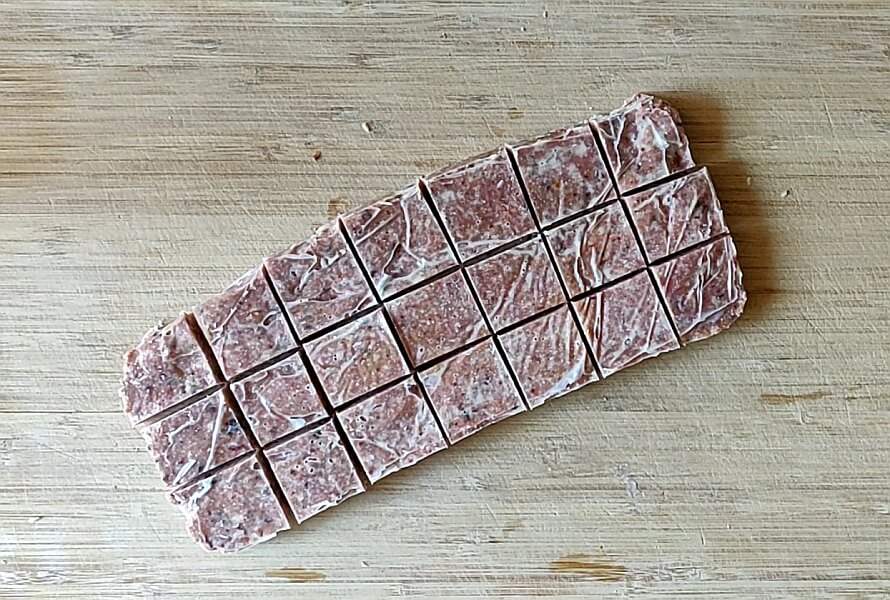 Coconut & Goji Berry Squares, sliced up on the chopping board