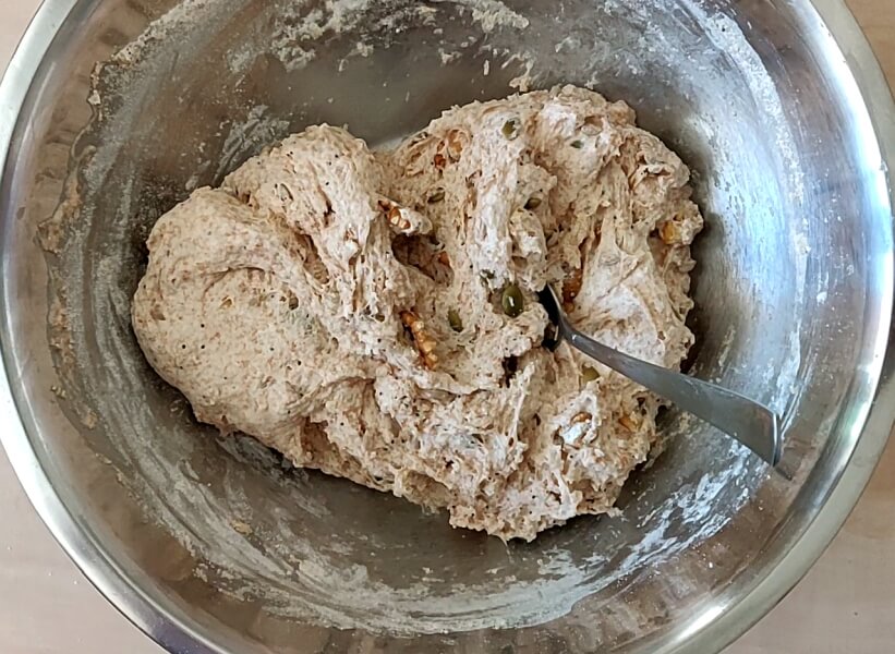 Bread dough mixed up in a bowl